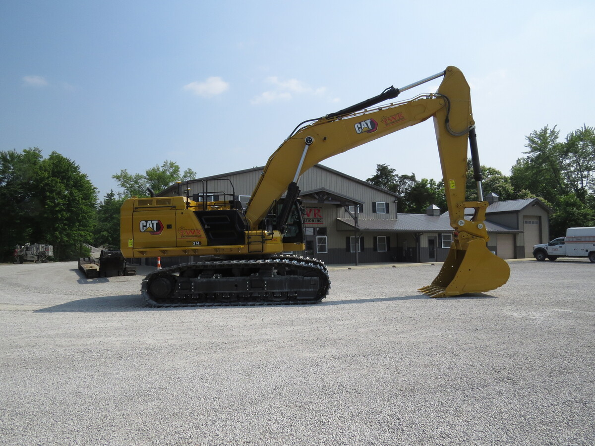 display of bulldozers and TWR hat on case