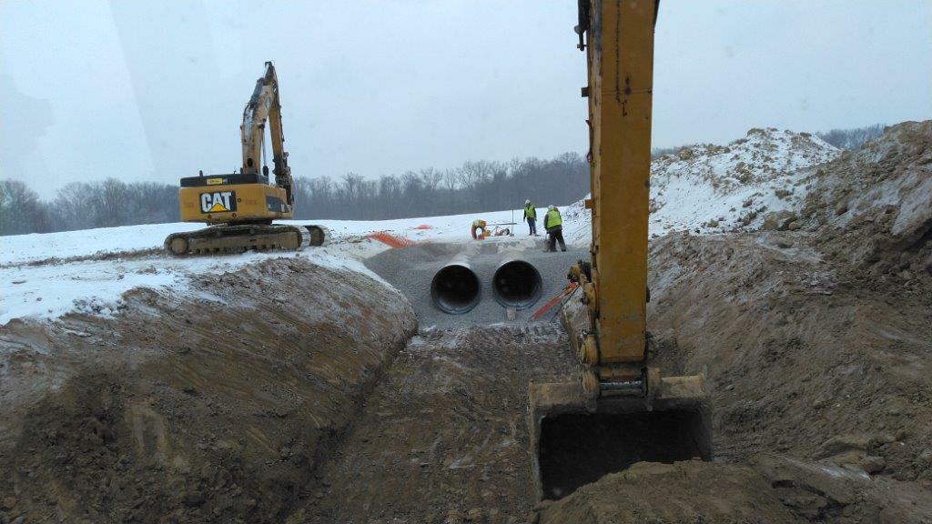 crane picking up pipe